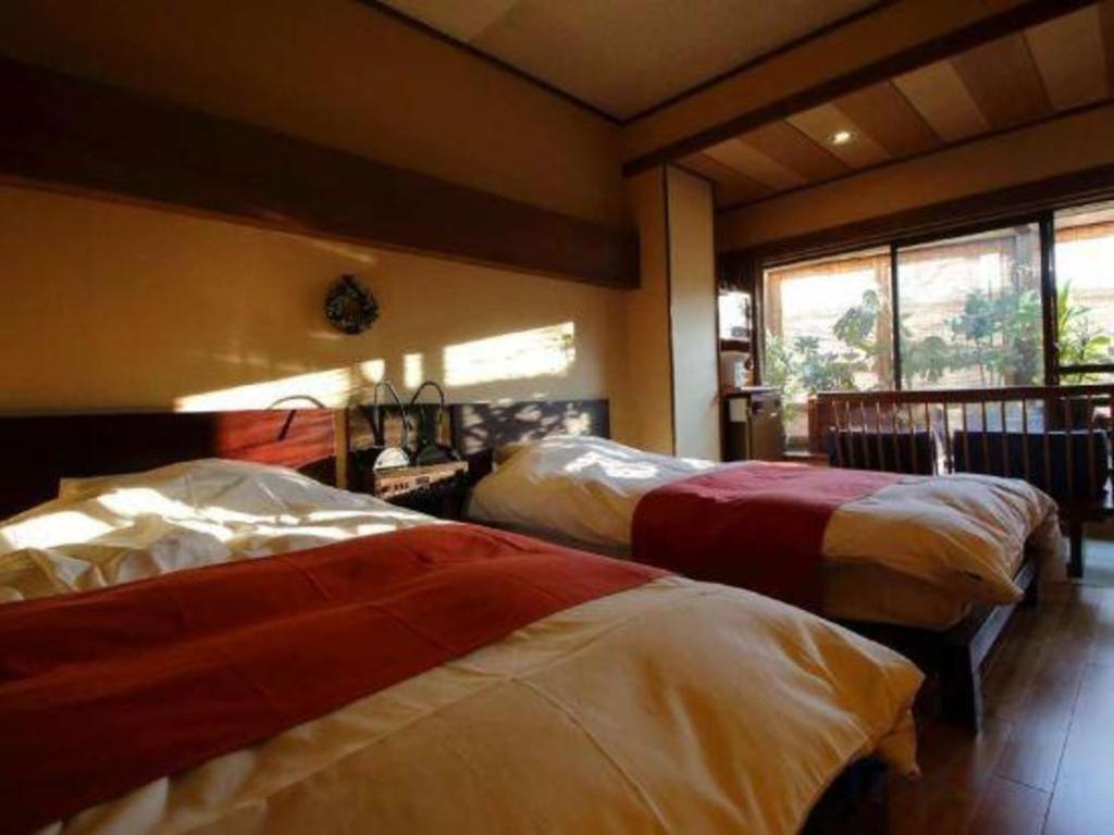 Tsukino Sumika Atami Juraku Hotel Buitenkant foto