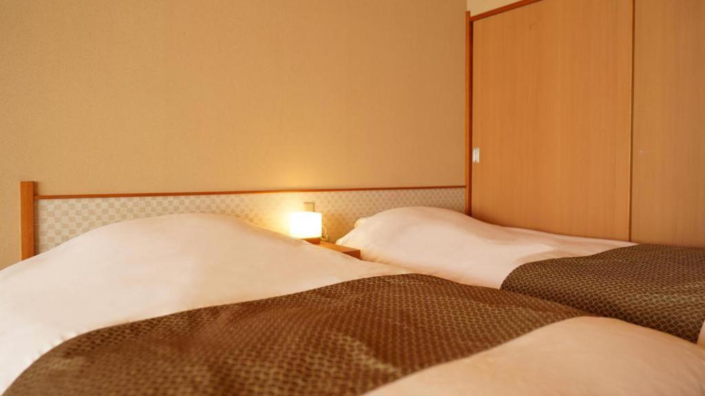 Tsukino Sumika Atami Juraku Hotel Buitenkant foto