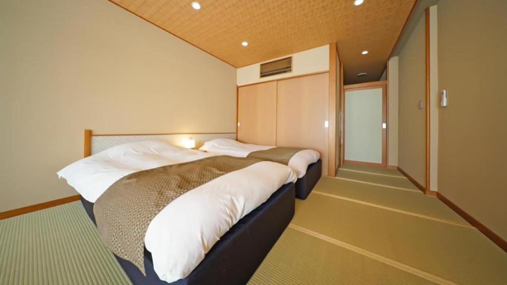 Tsukino Sumika Atami Juraku Hotel Buitenkant foto